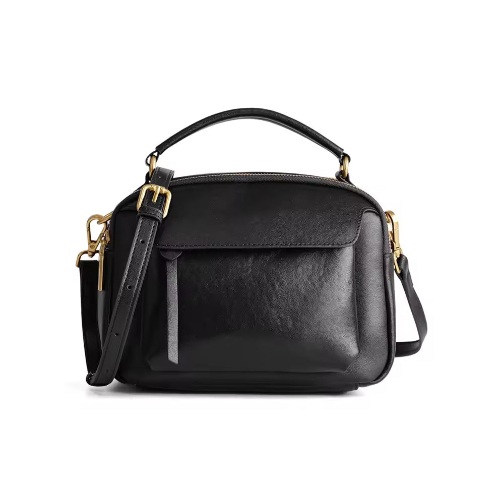 Graue Echtleder Handtasche für Damen aus Rindsleder, seitliche Ansicht